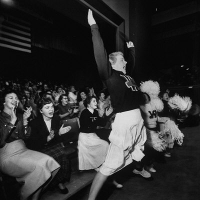 Cheering Section of Cheerleaders in Spokane Coliseum Poster