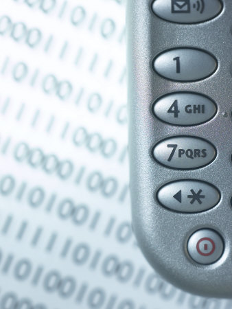 Cropped Close-Up of Cell Phone on Top of Page of Binary Code