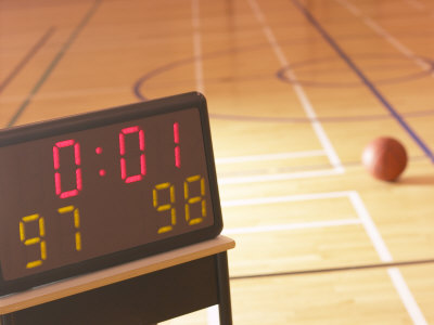 Digital Scoreboard Noting the Score and Time Left on Clock During Basketball Game Poster