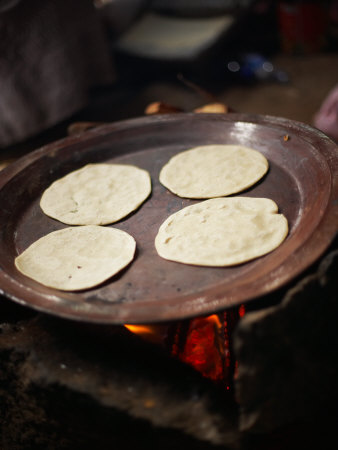 Delicious Tortillas Cooking on Hot Griddle