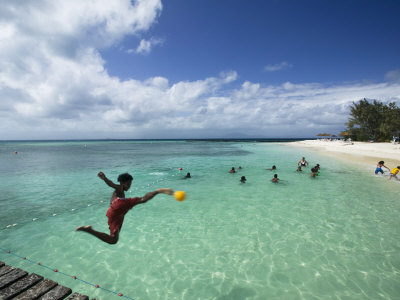 New Caledonia, Amedee Islet, Polynesian Kids Playing on Amedee Islet Beach