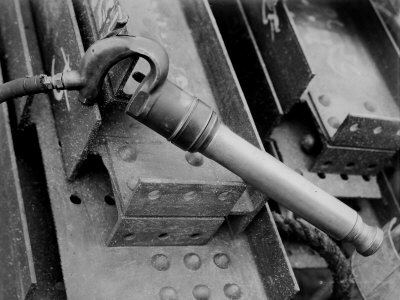 Rivet Gun known as the Cricket on Construction Site of the Manhattan Building Company