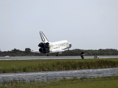 Space Shuttle Discovery Touches Down on the Runway at Kennedy Space Center