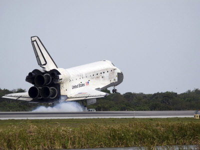 Space Shuttle Discovery Touches Down on the Runway at Kennedy Space Center
