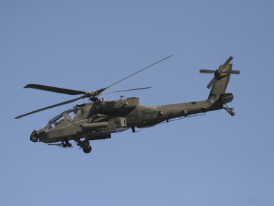 AH-64 Apache in Flight over the Baghdad Hotel in Central Baghdad, Iraq