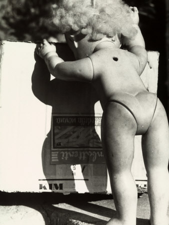 Abandoned Doll Next to a Box