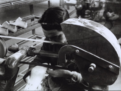 Worker Polishing the Form of a Shoe at the Marzocchi Shoe Factory