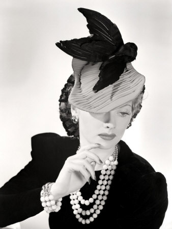 Lucille Ball Models a Unique Hat for a Publicity Still, 1940