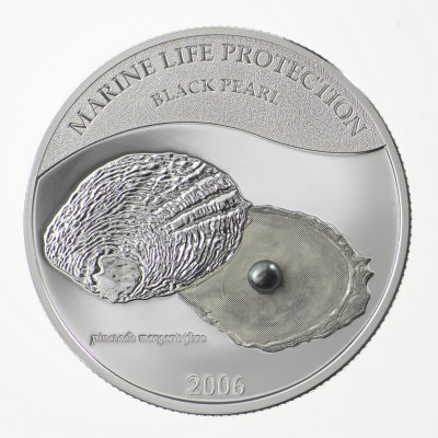 Buy An embedded pearl on a commemorative coin from Palau at AllPosters.com
