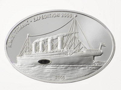 Buy Embedded coal from the Titanic in a coin from Liberia at AllPosters.com
