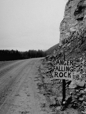 Roads Signs Indicating Dangerous Spot