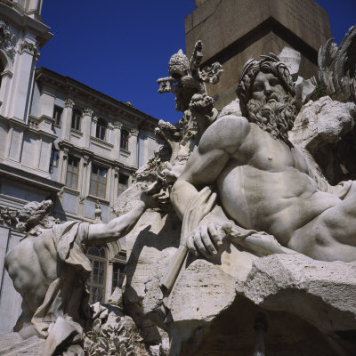 Low Angle View of Statues on a Fountain, Fountain of the Four Rivers, Piazza Navona, Rome, Italy