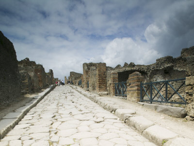 Tourists at Old Ruins, Pompeii, Naples, Campania, Italy