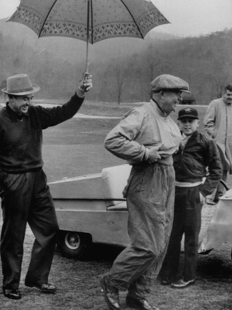 Dwight D. Eisenhower and Golf Pro Sam Snead Playing Golf in the Rain