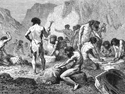 Cavemen Making and Polishing Flints