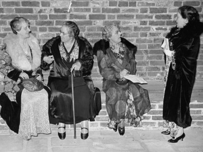 Old Die Hard Musical Women Sitting Outside the Opera House During Intermission