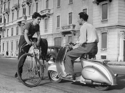 Two Men Talking in Street with Vespa Scooter and Bicycle