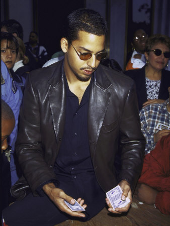 Magician David Blaine Performing a Magic Trick at Fao Schwartz Kids Day
