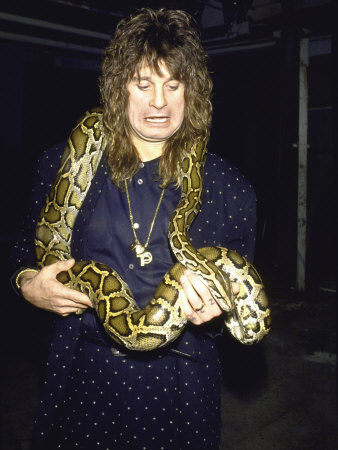 Rock Musician Ozzy Osbourne with a Snake around His Neck