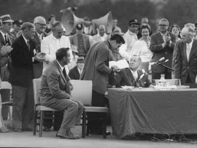 Arnold Palmer Looking on as Bobby Jones Is Presenting Prize Green Coat to the Winner Gary Player