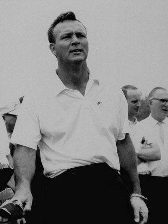 Golf Pro Arnold Palmer Putting Hand on Clubs Between Shots During Tournament