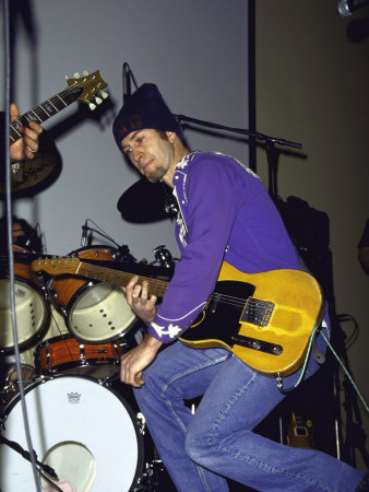 Tennis Pro John Mcenroe Playing the Guitar at the Opening of the All Star Cafe