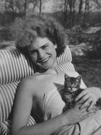 Photographer Margaret Bourke-White on a Lounge Chair Holding a Kitten