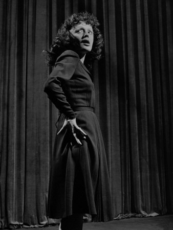 Singer Edith Piaf with Hands on Hips, Standing on Stage