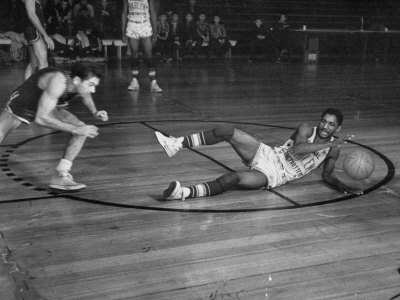 Buy Harlem Globetrotter Marques Haynes Playing a Basketball Game at AllPosters.com