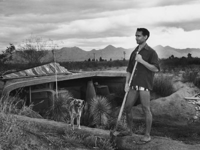 Architect Paolo Soleri Standing Outside His Underground, Concrete House