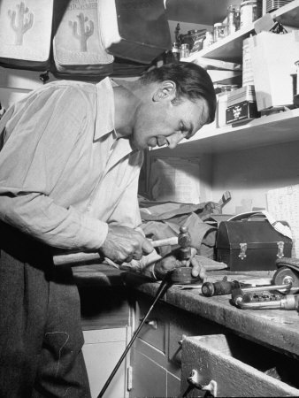 Golfer Ben Hogan Working on Golf Club in Workshop