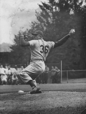 Dodger Don Newcombe Ready to Throw Ball During Game with Braves