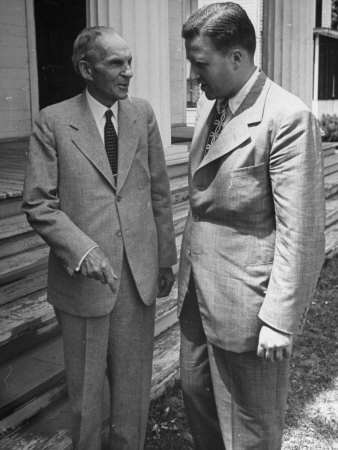 Henry Ford Talking with Son Henry Ford Ii