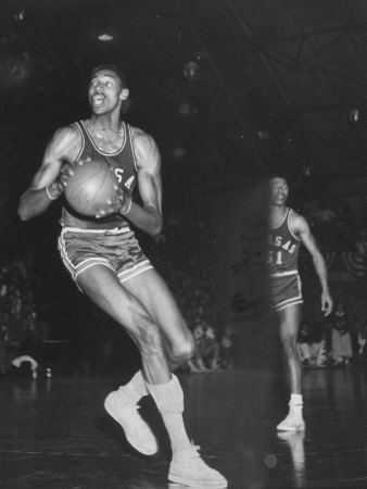 Wilt Chamberlain Playing Basketball During a Game Against Iowa State