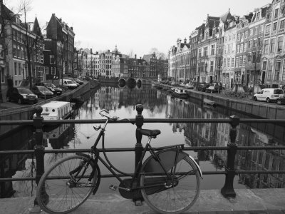 Black and White Imge of an Old Bicycle by the Singel Canal, Amsterdam, Netherlands, Europe
