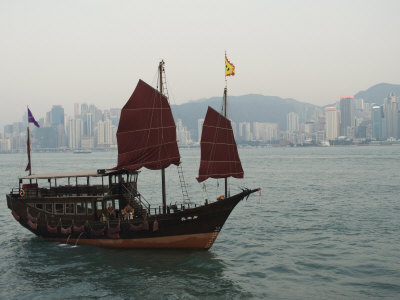 Junk Style Tourist Boat Sailing in Victoria Harbour, Hong Kong, China
