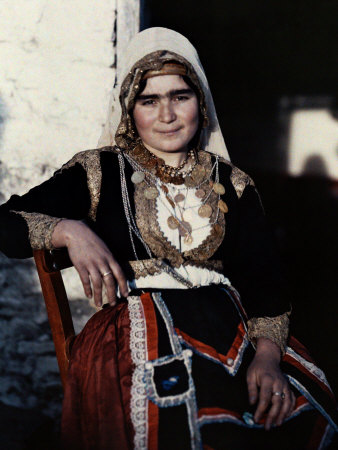 Woman Poses in the National Costume of Crete