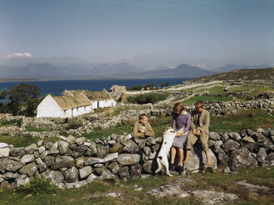 Teenagers Relax on a Stonewall Near their Home in Connemara