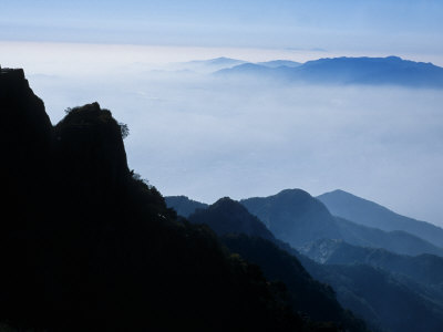 Lone Figure Stands on a Cliff of Mt. Tai During the Moon Festival