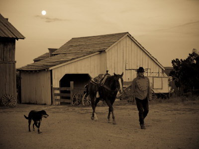 Cowboy Actor, Horse and Dog on an Old Western Movie Set