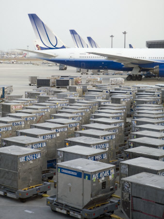 Buy United Airlines Cargo Containers are Lined Up at Tokyo Narita Airport at AllPosters.com