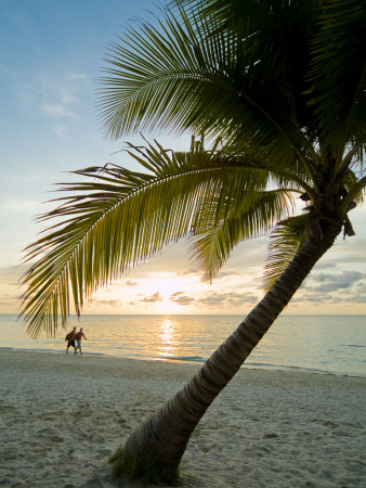 Honduras, Roatan Island, West Bay Beach, People Walking on Beach in Distance