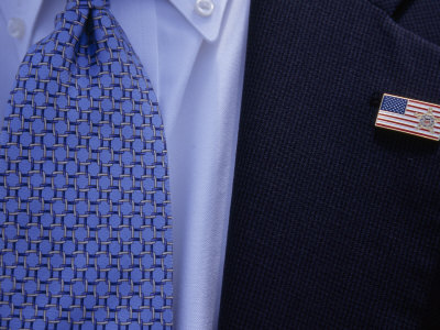 Tie and Lapel Pin on a Secret Service Agent Guarding President Bush
