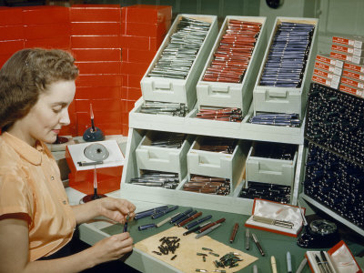 Buy Woman Inserts Nibs into Fountain Pen Barrels at AllPosters.com