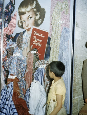 Boy Looks at a Poster Advertising Silks Spun in Turkish Mills