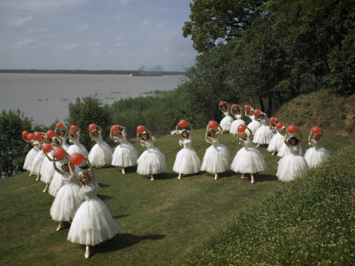 Buy Costumed Ballet Dancers Pose on a Lawn Overlooking Mississippi River at AllPosters.com