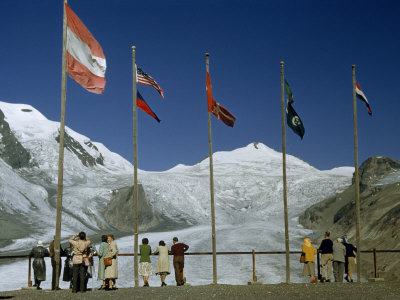 Tourists Look at Glacier from Overlook, Flags Honor Foreign Visitors