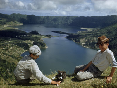Buy Men with Puppy Overlook Hourglass-Shaped Lakes in Volcanic Crater at AllPosters.com