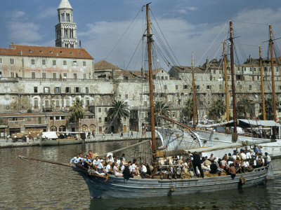 Boat Loaded with Travelers Leaves Split