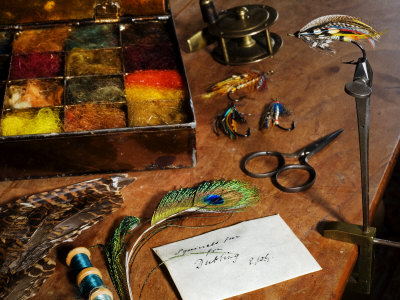 Uk, Antique Fly-Tying Equipment with a Traditionally Tied Salmon Fly in Vice on a Fly-Tiers Bench
